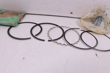 Load image into Gallery viewer, 1973-1974 YAMAHA TX500 NOS OEM 2ND OVER PISTON RINGS 371-11610-23  1975 XS500