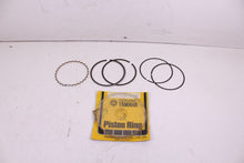 Load image into Gallery viewer, 1973-1974 YAMAHA TX500 NOS OEM 1ST OVER PISTON RINGS 2F1-11610-10 75-78 XS500