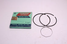 Load image into Gallery viewer, 1975-1976 Yamaha DT400 NOS OEM 3rd Over Piston Rings 500-11610-30