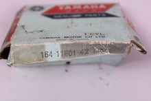 Load image into Gallery viewer, YAMAHA NOS OEM 4TH 1.00 OVER PISTON RINGS 164-11601-42