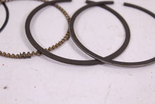 Load image into Gallery viewer, 1973-1974 YAMAHA TX750 NOS OEM 1ST OVER PISTON RINGS 341-11610-11