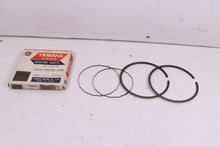 Load image into Gallery viewer, 1970-1971 RT1 MX 360 NOS OEM STD PISTON RINGS 275-11601-00
