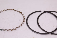 Load image into Gallery viewer, 1973-1974 YAMAHA TX500 NOS OEM 1ST OVER PISTON RINGS 2F1-11610-10 75-78 XS500