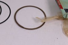 Load image into Gallery viewer, YAMAHA NOS OEM 3RD OVER PISTON RINGS 341-11610-30