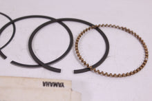 Load image into Gallery viewer, 1978-1979 YAMAHA XS750 S NOS OEM 3RD OVER PISTON RINGS 2F3-11610-33