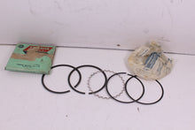 Load image into Gallery viewer, 1973-1974 YAMAHA TX500 NOS OEM 2ND OVER PISTON RINGS 371-11610-23  1975 XS500