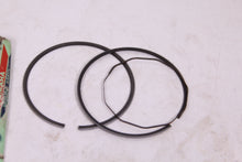 Load image into Gallery viewer, YAMAHA DT125 NOS OEM 2ND OVER PISTON RINGS  2A6-11610-20