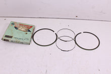 Load image into Gallery viewer, 1970-1971 YAMAHA RT1 MX 360 NOS OEM 3RD OVER PISTON RINGS 275-11601-30