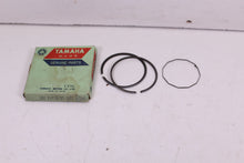 Load image into Gallery viewer, 1974-1976 YAMAHA RD200 NOS OEM 3RD OVER PISTON RINGS 397-11610-32