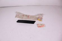 Load image into Gallery viewer, 1974-1977 KAWASAKI KZ400 NOS CHAIN COVER TRIMMING / SIDE COVER 36029-005-6Z