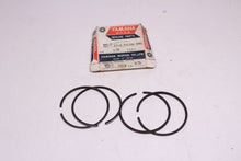 Load image into Gallery viewer, 1965-1966 Yamaha YDS3 NOS OEM 3rd Over Piston Rings  156-11610-30