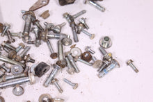 Load image into Gallery viewer, 2011 HUSQVARNA TE 511 CHASSIS BOLT AND HARDWARE KIT / FRAME NUTS WASHERS SCREWS