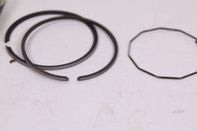 Load image into Gallery viewer, 1974-1976 YAMAHA RD200 NOS OEM 3RD OVER PISTON RINGS 397-11610-32