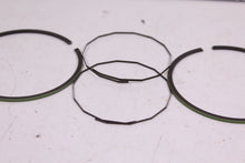 Load image into Gallery viewer, 1970-1971 YAMAHA RT1 MX 360 NOS OEM 3RD OVER PISTON RINGS 275-11601-30