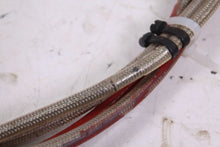 Load image into Gallery viewer, 1988 HONDA TRX250R RUSSEL AFTERMARKET STAINLESS BRAIDED FRONT BRAKE LINES