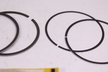 Load image into Gallery viewer, 1973-1974 YAMAHA TX500 NOS OEM 1ST OVER PISTON RINGS 2F1-11610-10 75-78 XS500