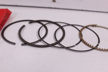 Load image into Gallery viewer, 1977-1978 HONDA CB550 NOS OEM STD PISTON RINGS 13011-374-000