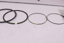 Load image into Gallery viewer, 1970-1972 YAMAHA R5 350 NOS OEM 2ND OVER PISTON RINGS 278-11610-21