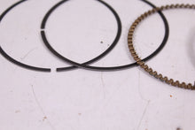 Load image into Gallery viewer, 1973-1974 YAMAHA TX750 NOS OEM 1ST OVER PISTON RINGS 341-11610-11