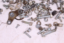 Load image into Gallery viewer, 2011 HUSQVARNA TE 511 CHASSIS BOLT AND HARDWARE KIT / FRAME NUTS WASHERS SCREWS