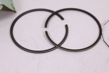 Load image into Gallery viewer, 1970-1972 YAMAHA R5 350 NOS OEM 1ST OVER PISTON RINGS 278-11610-11
